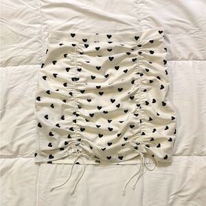 Adika White Skirt with Black Heart Pattern